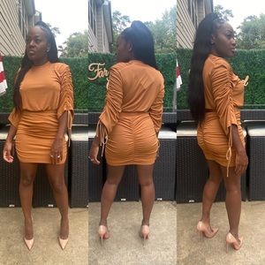 Camel 2 piece skirt set. Sleeves of shirt runches